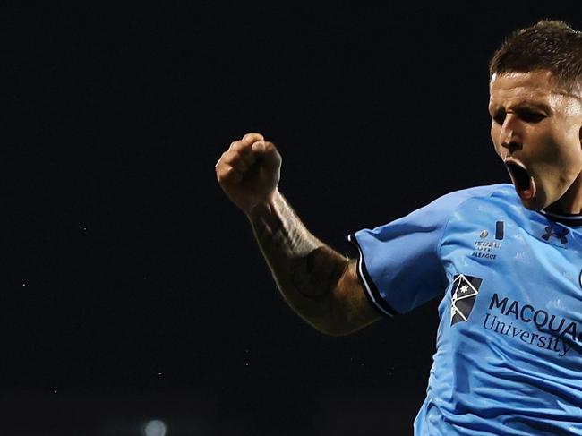 SYDNEY, AUSTRALIA - MARCH 01: Patryk Klimala of Sydney FC celebrates kicking a goal during the round 21 A-League Men match between Macarthur FC and Sydney FC at Campbelltown Stadium, on March 01, 2025, in Sydney, Australia. (Photo by Cameron Spencer/Getty Images)