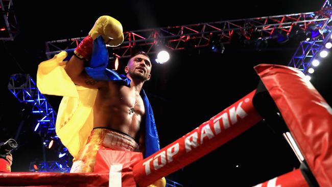 Vasyl Lomachenko of Ukraine reacts after defeating Miguel Marriaga.