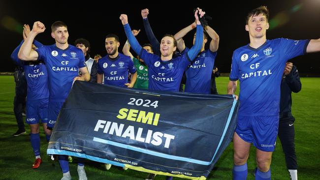 South Melbourne celebrates winning through to the Australia Cup semi-finals.