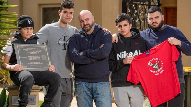 Toto’s Pizza owner Zain Mazloum, 45, said the lockdown had pushed his iconic business to the brink. He is pictured at home with children Matthew, 10, James, 15, Andrew, 13 and Sami, 19. Picture: Jason Edwards