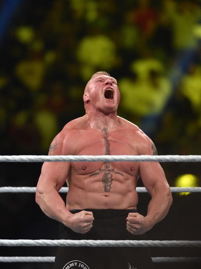 Brock Lesnar celebrates after winning the WWE Universal Championship match as part of as part of the World Wrestling Entertainment (WWE) Crown Jewel pay-per-view at the King Saud University Stadium in Riyadh on November 2, 2018. Picture: AFP