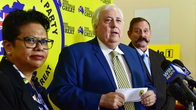 Clive Palmer, centre, says he’s already paid Queensland Nickel workers their entitlements. Picture: Shae Beplate.