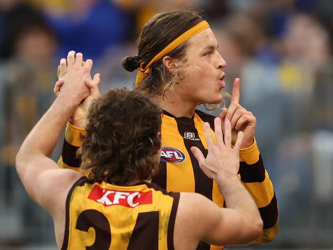 PERTH, AUSTRALIA - JUNE 30: Jack Ginnivan of the Hawks celebrates after scoring a goal during the 2024 AFL Round 16 match between the West Coast Eagles and the Hawthorn Hawks at Optus Stadium on June 30, 2024 in Perth, Australia. (Photo by Will Russell/AFL Photos via Getty Images)