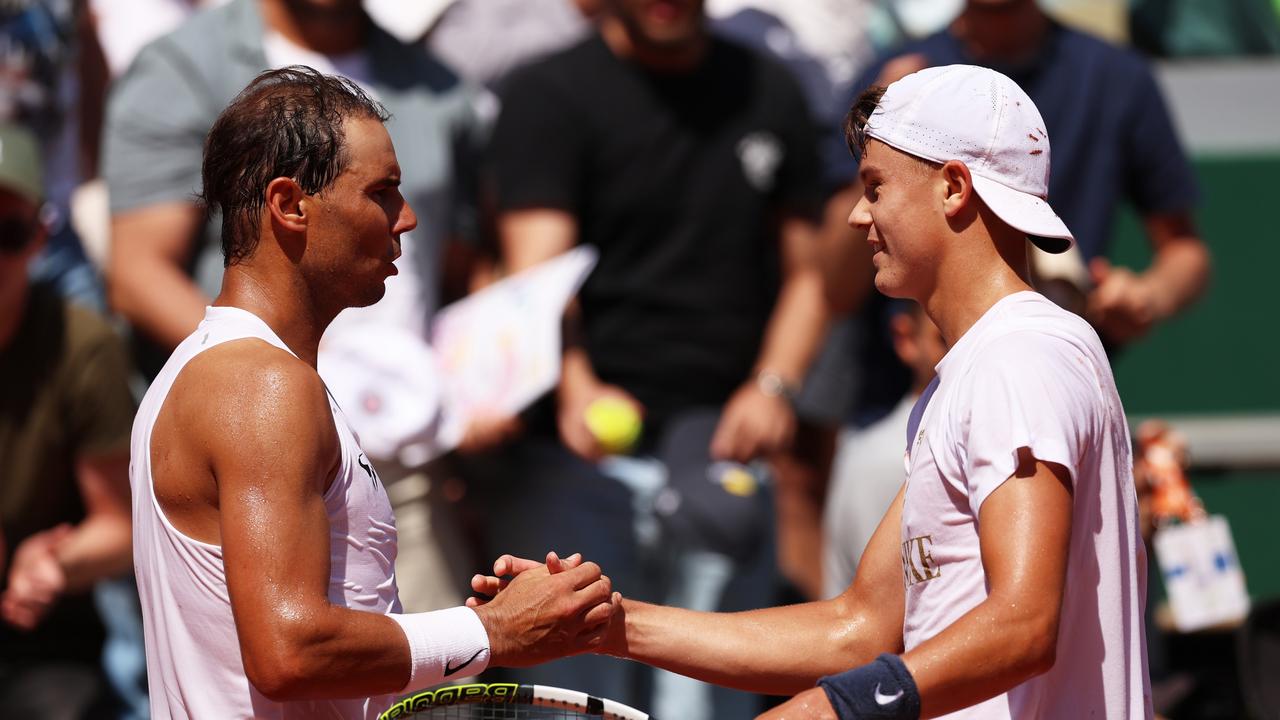PARIS, FRANCE - MAY 25: Rafael Nadal of Spain shakes hands with Holger Rune of Denmark after their practice match prior to the French Open at Roland Garros on May 25, 2024 in Paris, France. (Photo by Clive Brunskill/Getty Images)