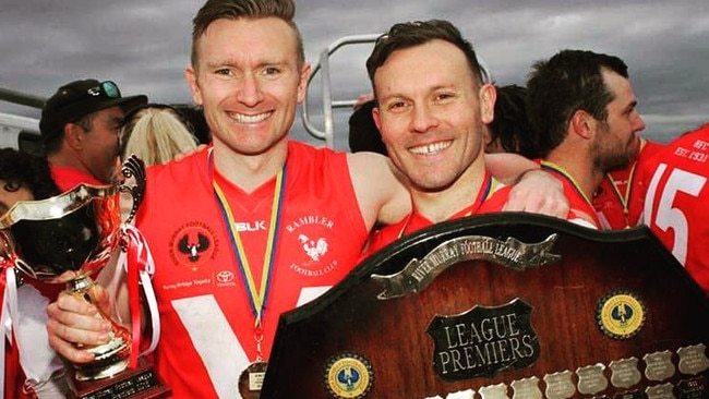 Liam O'Neil (right) celebrates a premiership for Ramblers with brother Patrick. Picture: Supplied