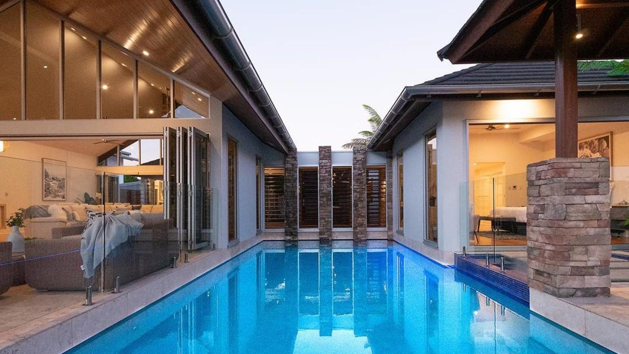 This five bedroom waterfront property at 11 Brindabella Quay, Trinity Park, is being marketed by Nathan Shingles of FNQ Hot Property, with an asking price of $2.5m. Picture: supplied.