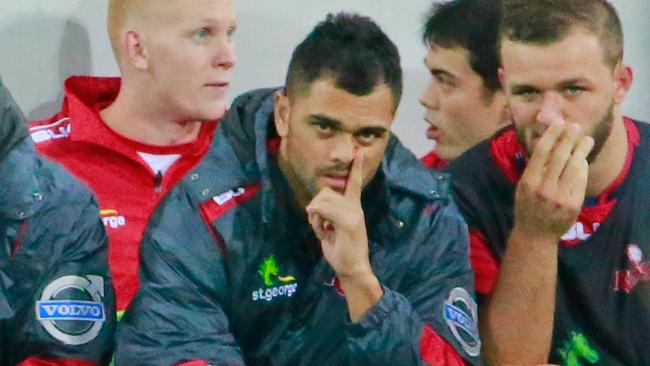 MELBOURNE, AUSTRALIA - APRIL 03: Karmichael Hunt of the Reds looks on from the bench during the round eight Super Rugby match between the Rebels and the Reds at AAMI Park on April 3, 2015 in Melbourne, Australia. (Photo by Scott Barbour/Getty Images)