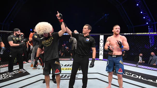 Khabib Nurmagomedov celebrates his victory over Justin Gaethje, before announcing his UFC retirement. Picture: Getty