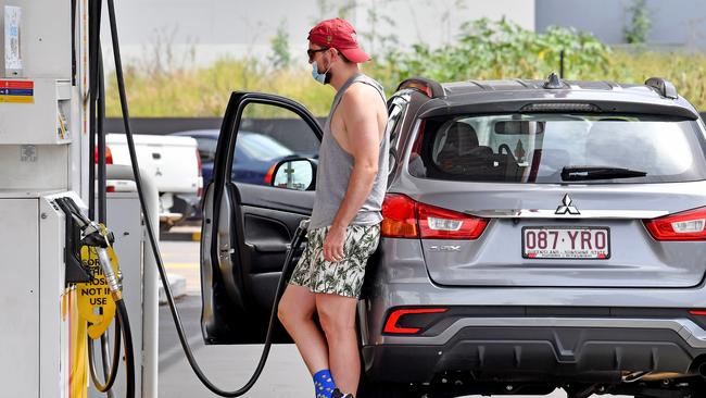 A motorist filling up as petrol prices rise. Picture: NCA NewsWire / John Gass