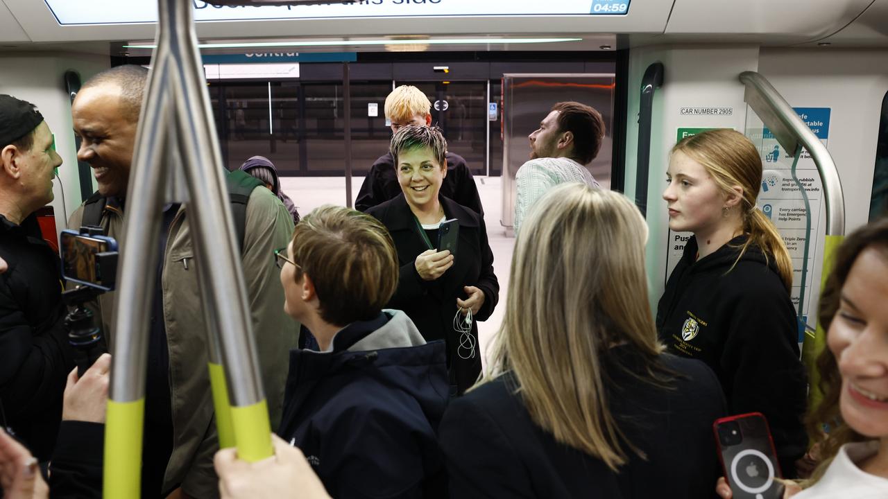 Pictured are passengers joining a carriage at Central Station during its journey from Sydenham Station on the brand new Sydney Metro on its maiden run to Tallawong at 4.54am. Picture: Richard Dobson