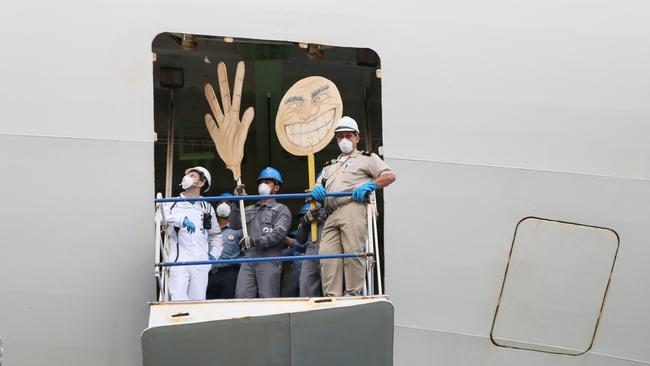 Crew members on board the Ruby Princess as it departed Port Kembla on Thursday. Picture: NSW Police