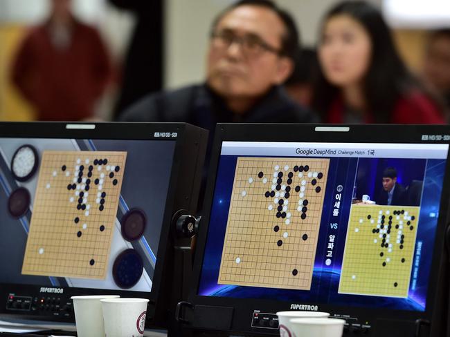South Korean Go game fans watching a television screen broadcasting live footage of the Google DeepMind Challenge Match in Seoul last year. Picture: Jung Yeon-Je