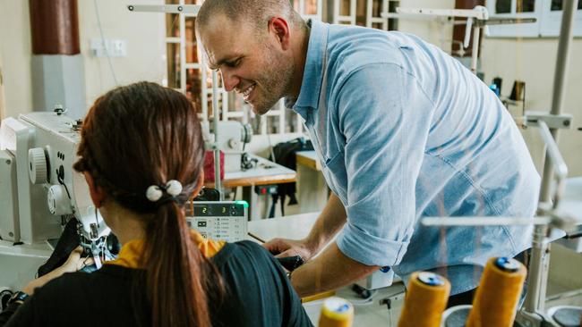 Outland Denim founder James Bartle of Mount Tamborine. The products are made in Cambodia by a social enterprise employing vulnerable women and girls.