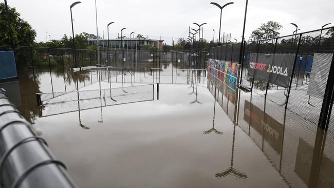 Flooding on the Gold coast in the aftermath of Cyclone Alfred. KDV Tennis complex goes under. Picture Glenn Hampson