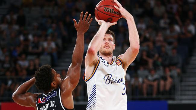 Cameron Gliddon shoots past Casper Ware. (Michael Dodge/Getty Images)