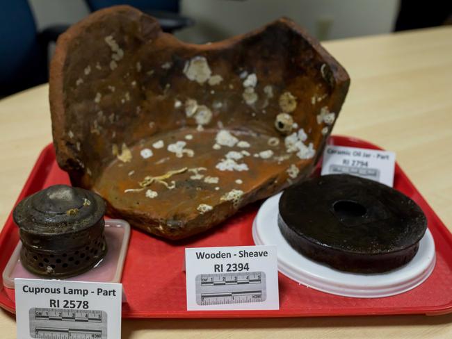 Relics recovered from one of the 13 sunken British transport ships in Newport harbour. Picture: Brad Smith.