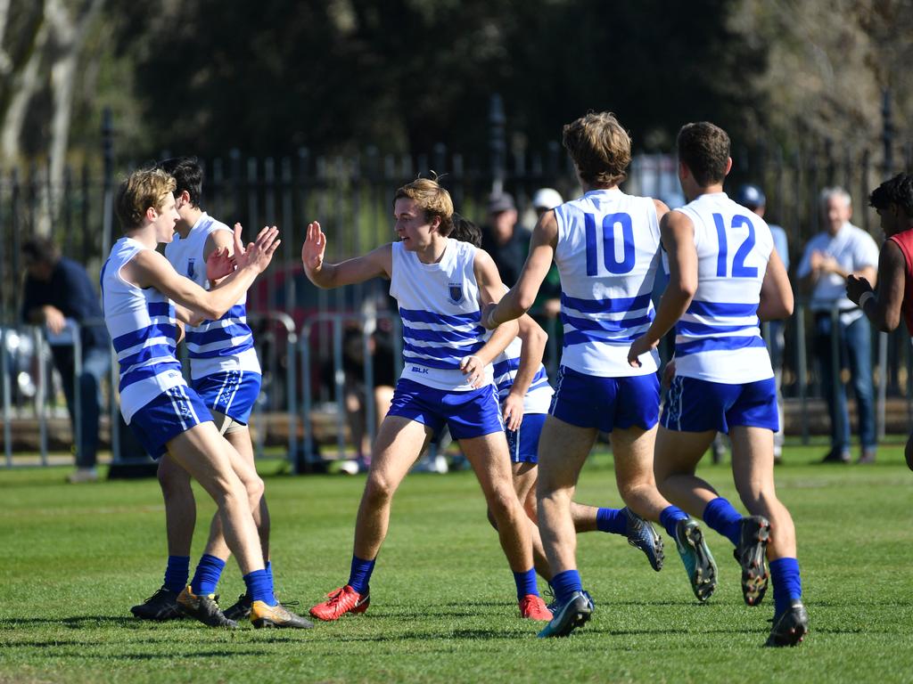 St Peter’s teammates celebrate a goal against Prince Alfred on Saturday. Picture: AAP/ Keryn Stevens.