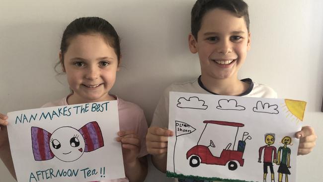 Evie and Billy Byron with their gorgeous artwork for their grandparents. Picture: Supplied.