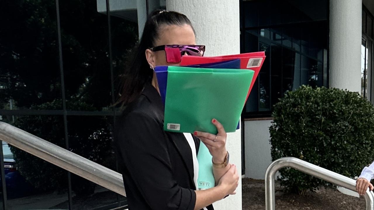 Eloise Kate Bloomfield leaving Maroochydore Magistrates Court on Monday with many folders. Picture: Sam Turner