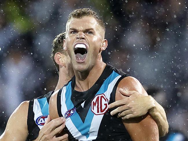 Port Adelaide's Dan Houston celebrates kicking a goal during the AFL Gather Round match between Port Adelaide and the Western Bulldogs at the Adelaide Oval on April 15, 2023. Photo by Phil Hillyard (Image Supplied for Editorial Use only – **NO ON SALES** – Â©Phil Hillyard )