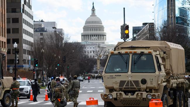 Members of the US National Guard stand watch on an intersection in Washington, DC during a nationwide protest called by anti-government and far-right groups supporting US President Donald Trump. Picture: AFP