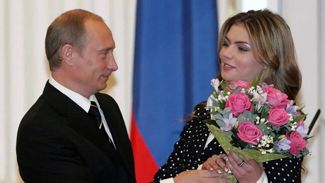 Olympic artistic gymnastic champion Alina Kabayeva and Vladimir Putin in 2005.