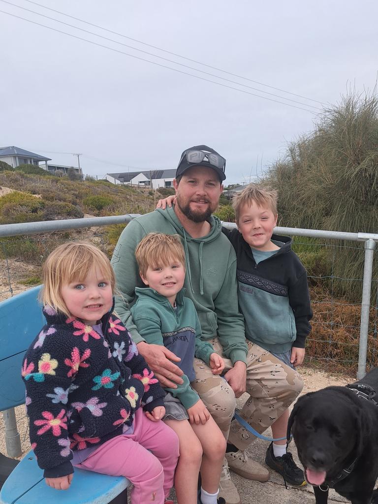 Sam Titterton performed CPR and revived his seven-year-old son Leo after he suffered a seizure. Leo (rear) with siblings Alby and Molly. Picture: Supplied