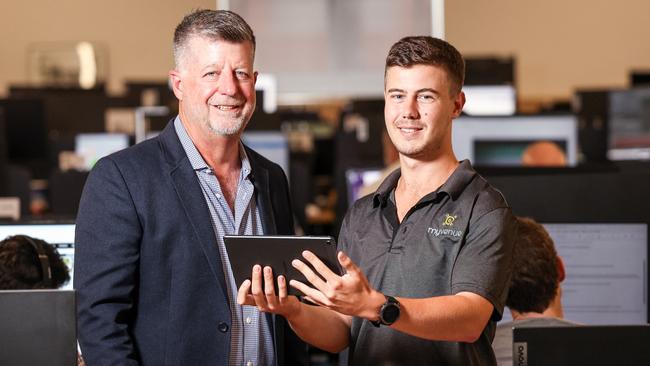 MyVenue chief executive Tim Stollznow with developer Angus Juers at Lot Fourteen. Picture: Russell Millard