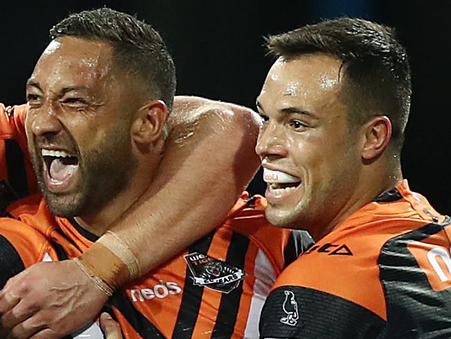 SYDNEY, AUSTRALIA - SEPTEMBER 01: Benji Marshall of the Tigers celebrates scoring a try with team mates during the round 24 NRL match between the St George Illawarra Dragons and the Wests Tigers at Sydney Cricket Ground on September 01, 2019 in Sydney, Australia. (Photo by Mark Metcalfe/Getty Images)