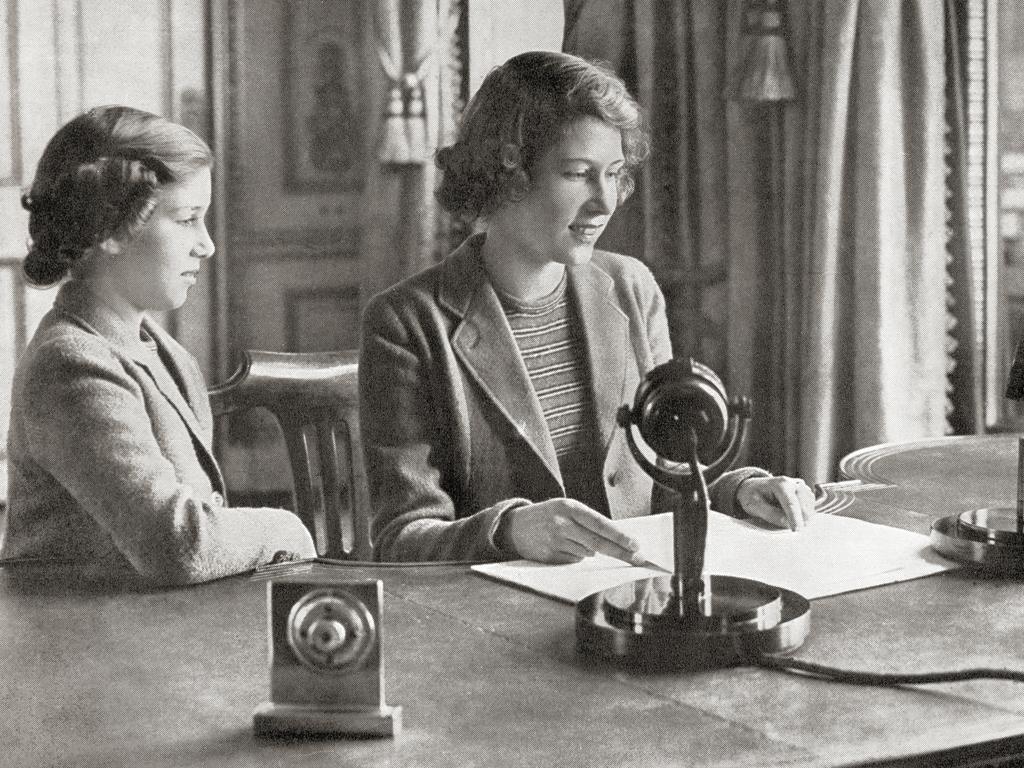 Princess Margaret, left, and Princess Elizabeth, right, broadcasting to the children of the empire on October 13, 1940. Picture: Universal History Archive/Universal Images Group via Getty Images