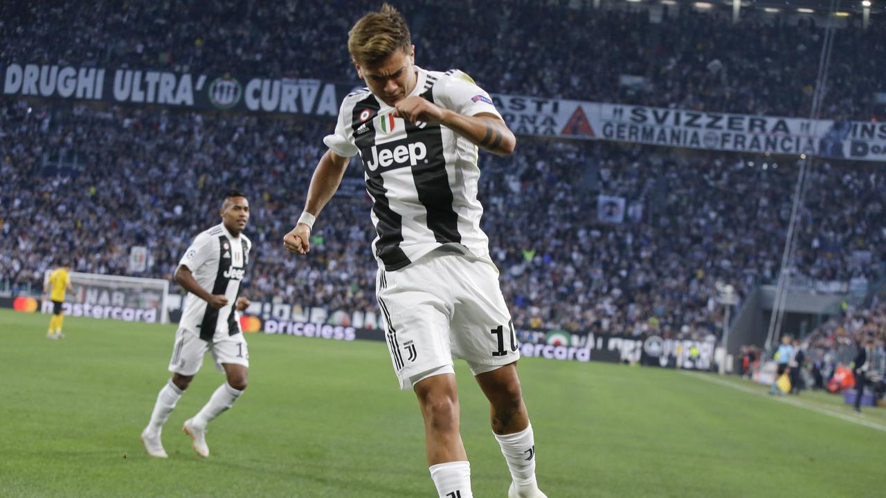Juventus' Paulo Dybala celebrates after scoring his side's opening goal