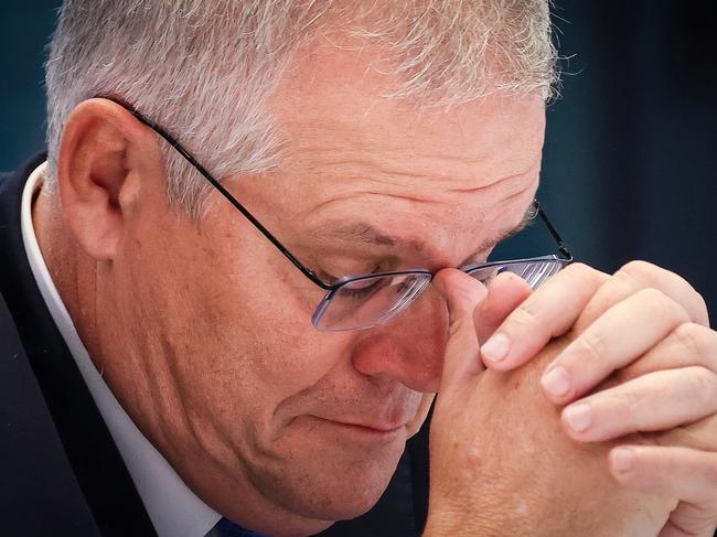 SYDNEY, AUSTRALIA - MAY 14: Prime Minister Scott Morrison prepares to speak during the Federal Budget Lunch at the Hyatt Regency Sydney on May 14, 2021 in Sydney, Australia. The Morrison government's third budget was delivered on Tuesday, with a focus on funding for women's health, aged care and infrastructure.  (Photo by David Gray/Getty Images)