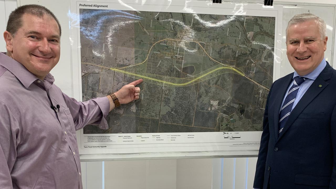 (L) Wide Bay MP Llew O'Brien and then-Deputy PM Michael McCormack show off a design for the Tiaro Bypass on the Bruce Highway. Photo: Stuart Fast