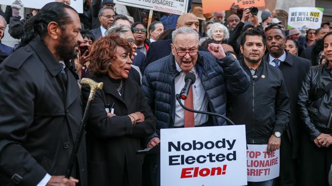 WASHINGTON, DC - FEBRUARY 04:  U.S. Senate Majority Leader Chuck Schumer (D-NY), with Rep. Maxine Waters (D-CA), speaks during the We Choose To Fight: Nobody Elected Elon rally at the U.S. Department Of The Treasury on February 04, 2025 in Washington, DC. (Photo by Jemal Countess/Getty Images for MoveOn)