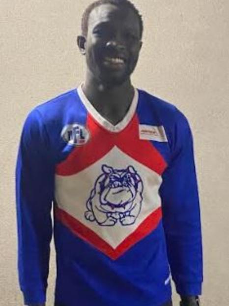 Majak Daw in red, white and blue.