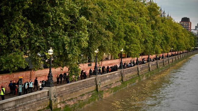 The public queues on the embankment between Westminster and Lambeth bridges in London on Wednesday. Picture: AFP