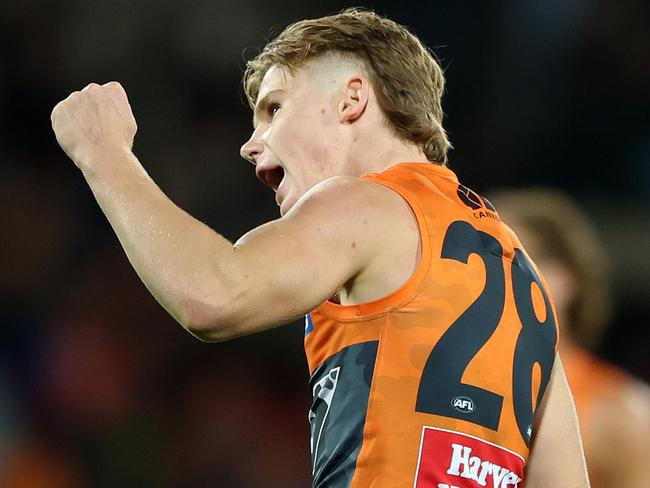 CANBERRA, AUSTRALIA – APRIL 25: Harvey Thomas of the Giants celebrates kicking a goal during the round seven AFL match between Greater Western Sydney Giants and Brisbane Lions at Manuka Oval, on April 25, 2024, in Canberra, Australia. (Photo by Mark Metcalfe/AFL Photos/via Getty Images )