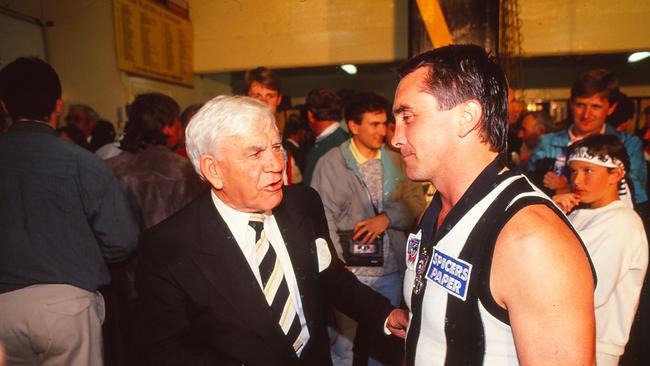 Lou Richards and Tony Shaw of the Magpies chat after the 1990 AFL Grand Final.