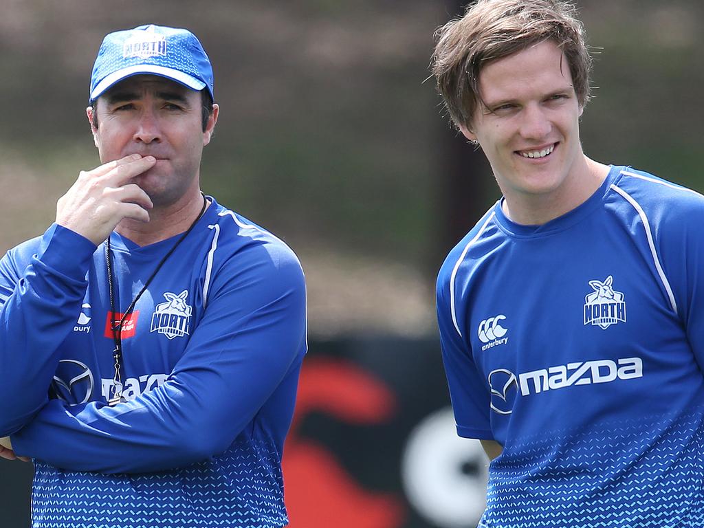 North Melbourne training. Coach Brad Scott and Jared Polec watch the yo yo test   . Pic: Michael Klein