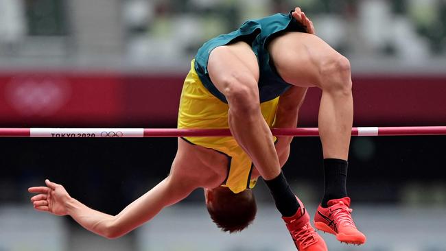 Australia's Brandon Starc flies over the bar during the heats.