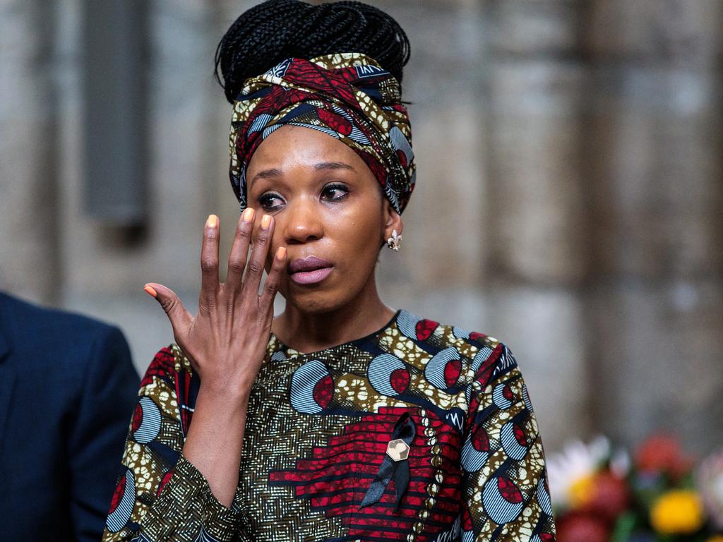 Zamaswazi Dlamini-Mandela, grand-daughter of Nelson Mandela wipes away tears as she attends a service to mark the centenary of the birth of the former South African President at Westminster Abbey on July 18, 2018 in London, England. A memorial stone to the late South African Leader and anti-apartheid revolutionary was dedicated in Westminster Abbey today. (Photo by Jack Taylor - WPA Pool/Getty Images)