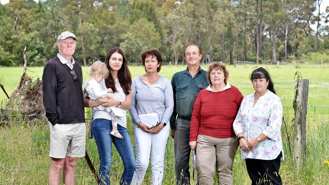 Somersby residents (l-r) Wal Shepherd, Sarah Hinde &amp; daughter Liliana, 1, Janette Cox, Bob Hunt, Wihelmina Hunt &amp; Therese Pisani don’t want the rates rise. Picture: AAP IMAGE / Troy Snook