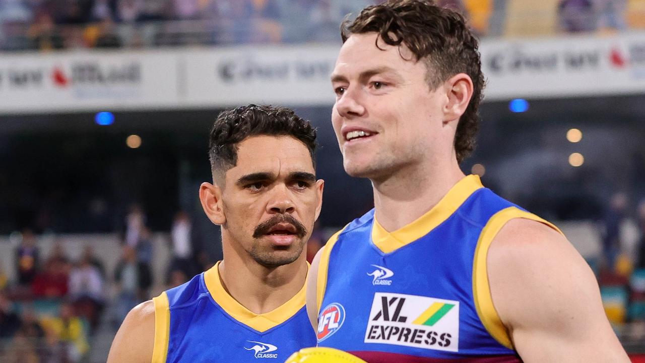 BRISBANE, AUSTRALIA – SEPTEMBER 01: Charlie Cameron and Lachie Neale of the Lions enter the field before the 2022 AFL Second Elimination Final match between the Brisbane Lions and the Richmond Tigers at The Gabba on September 1, 2022 in Brisbane, Australia. (Photo by Russell Freeman/AFL Photos via Getty Images)