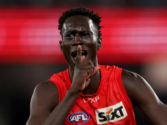 MELBOURNE, AUSTRALIA - AUGUST 10: Mac Andrew of the Suns celebrates a goal after the siren to win the game for the Suns during the round 22 AFL match between Essendon Bombers and Gold Coast Suns at Marvel Stadium, on August 10, 2024, in Melbourne, Australia. (Photo by Jonathan DiMaggio/Getty Images)