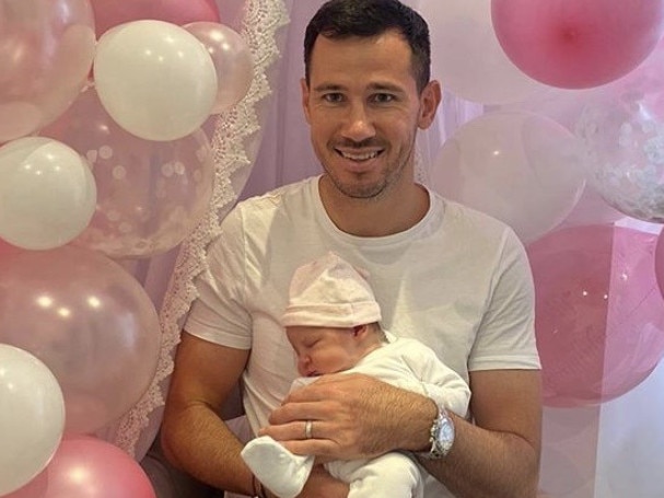 Sydney FC player Ryan Grant and baby Millie, Pic: Supplied