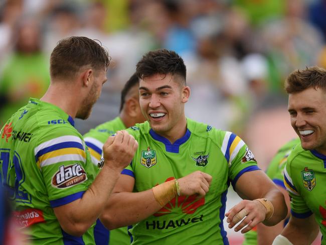 Nick Cotric celebrates after scoring his first try in the NRL.