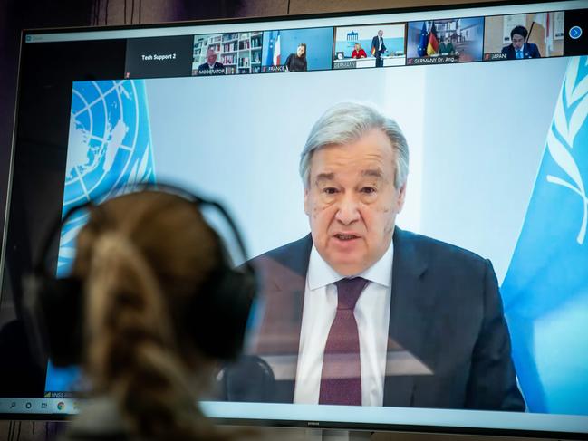 United Nations Secretary-General Antonio Guterres is seen on a screen. Picture: AFP)