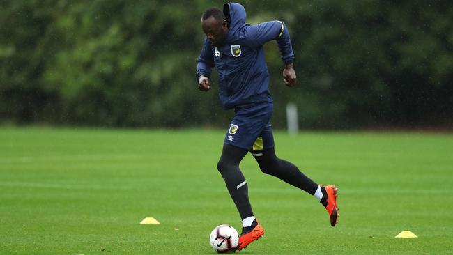 Usain Bolt trains in Tuggerah ahead of making his starting debut on Friday      Picture: Brett Costello