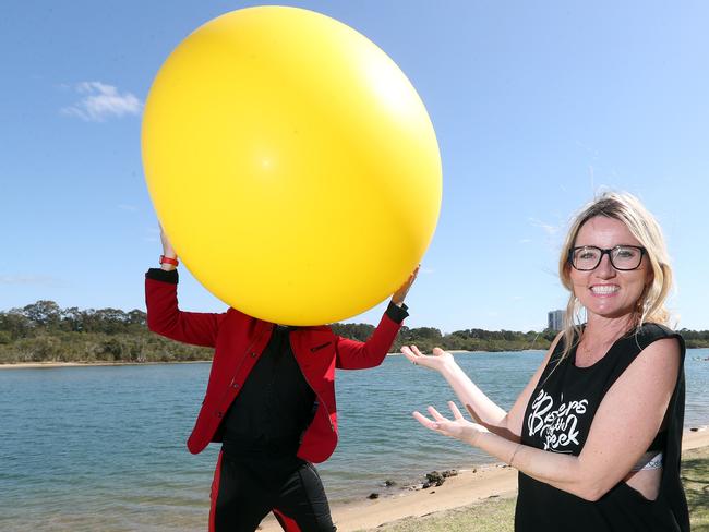 Natasha Stone gets a preview of Stuntman Joel’s Buskers By The Creek act at Winders Park, Currumbin.  Picture: Richard Gosling