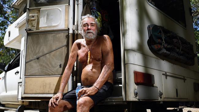 The Queensland Government have banned people from camping in their vehicles overnight on the Captain Cook Highway between Palm Cove and Port Douglas, but many still flout the law, while others are left with few alternatives. Peter Cooper lost his partner to cancer and lives with a chronic lung condition. He can't afford to stay permanently in a caravan park, and moves his 4WD campervan from place to place to avoid getting fined. Picture: Brendan Radke